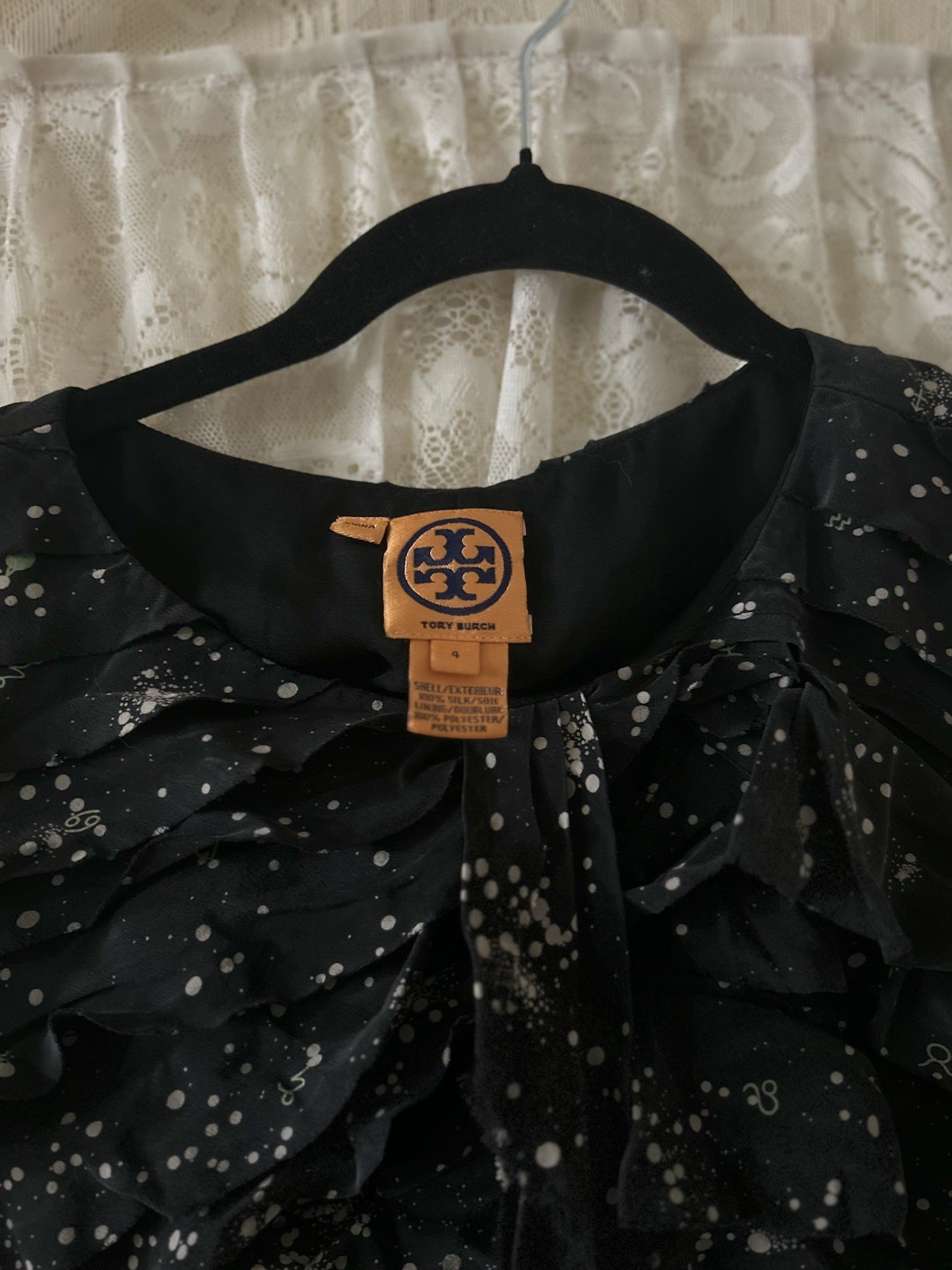 Tory Burch sleeveless Ruffle silk top, it has Zipper On One Side, Size 4