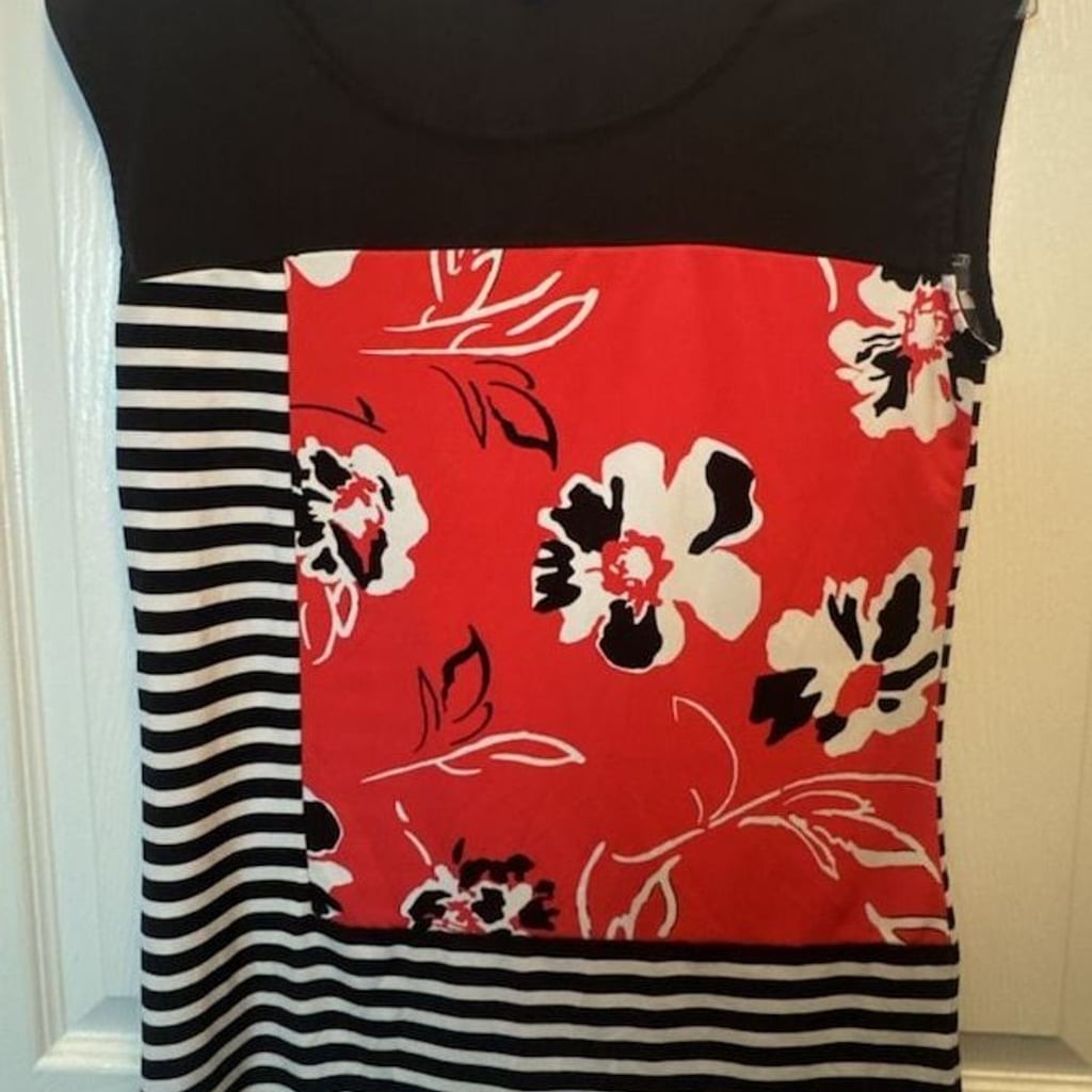 Calvin Klein Women’s Sleeveless Mixed-Print Top in Black, White, and coral Flora