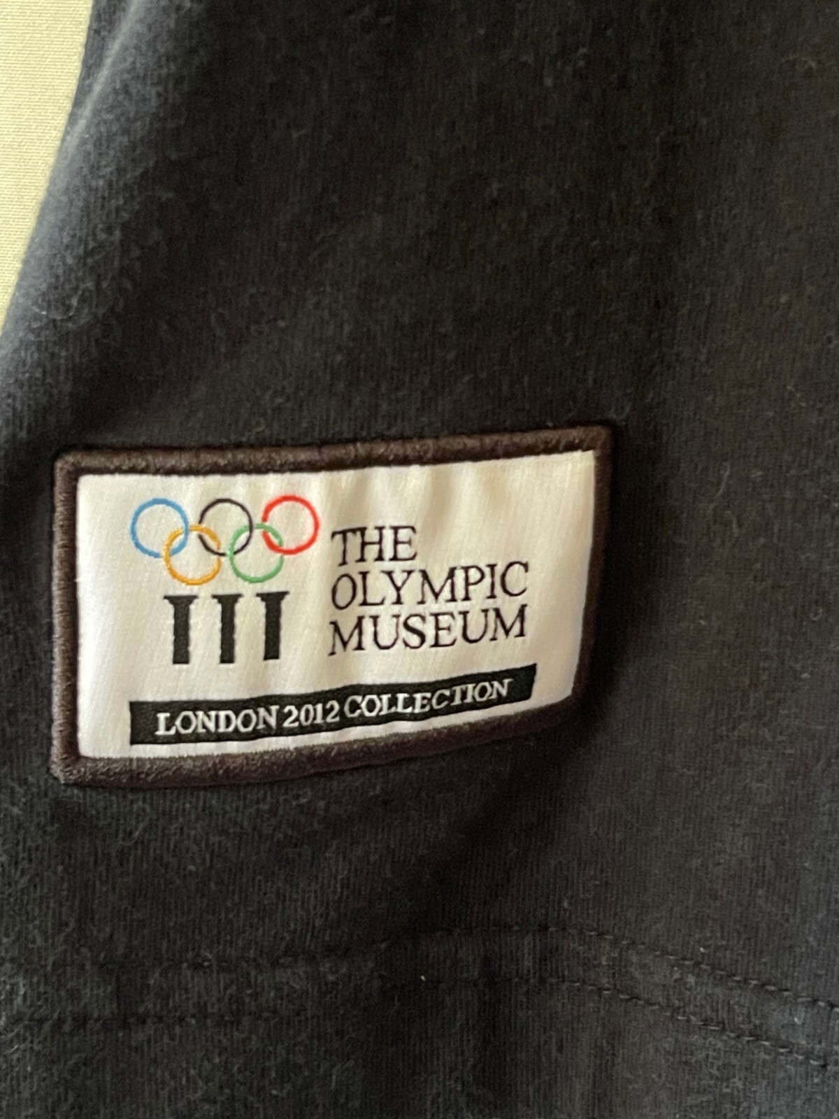 LONDON 2012 OLYMPIC MUSEUM HISTORIC COLLECTION BLACK TEE, WOMEN’S M 14 34″ CHEST