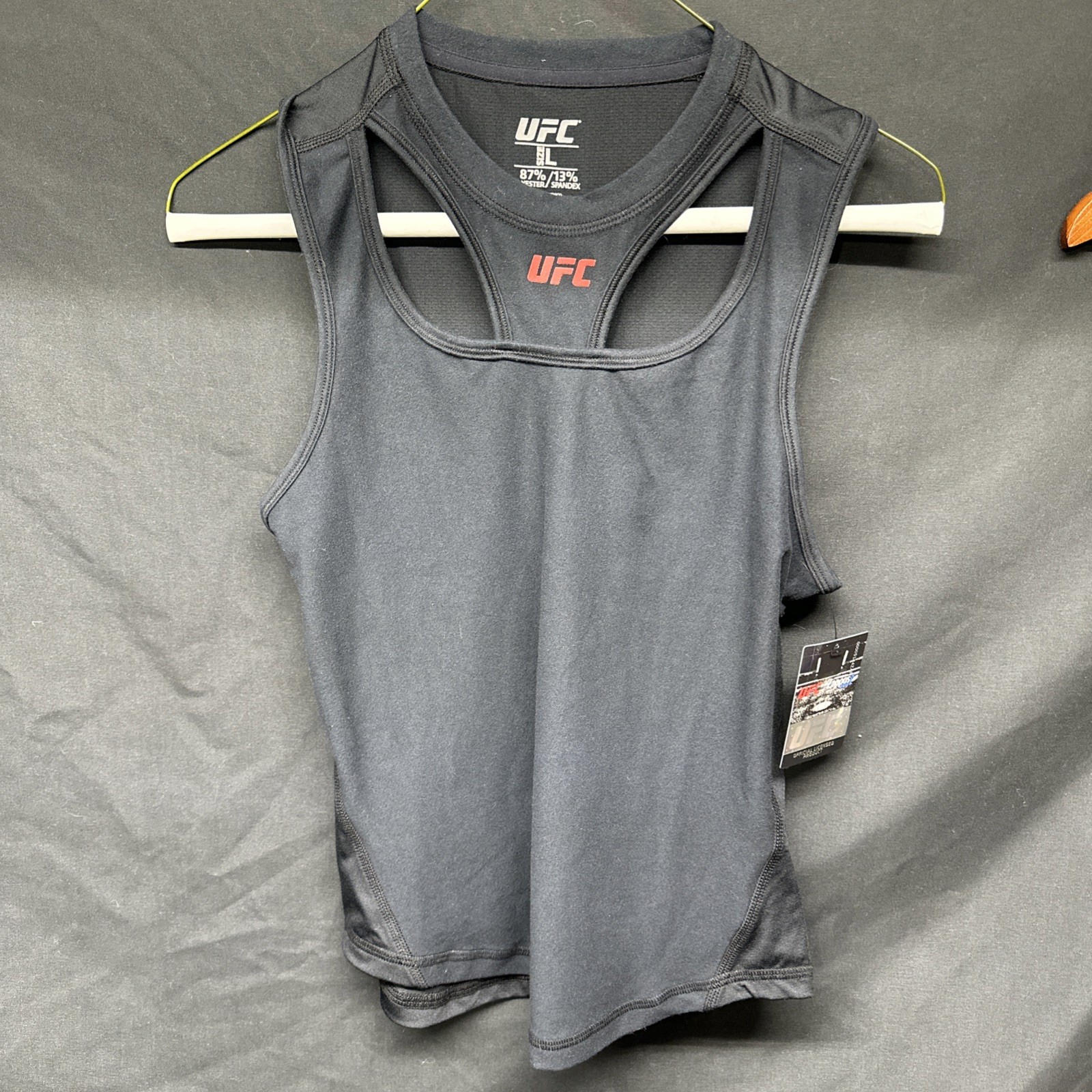 UFC Sleeveless Cutout Workout Top For Woman- Blended Fabric Size Large