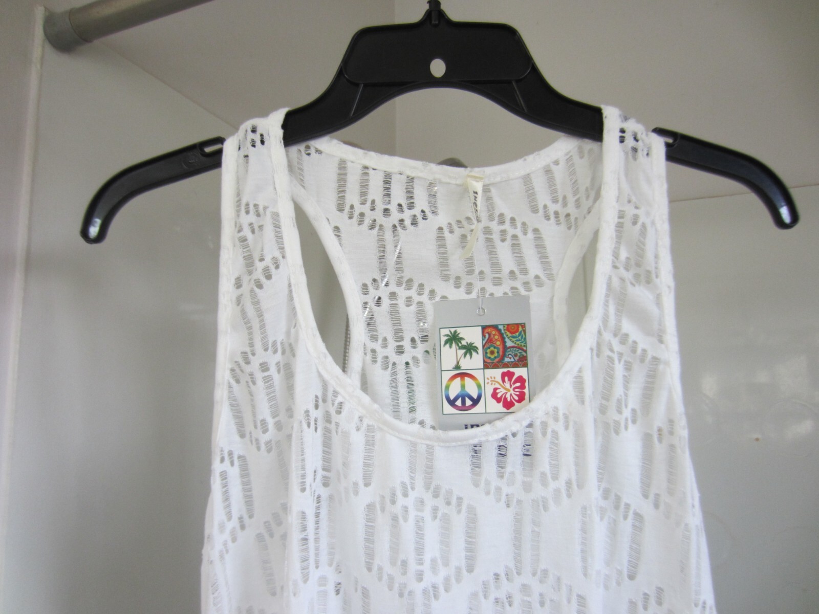 NWT women’s sleeveless top india Boutique Size OS white color